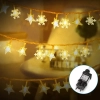 Niskonapięciowe lampki choinkowe 50 LED płatki śniegu i gwiazdki 5m ciepłe światło do przytulnego klimatu